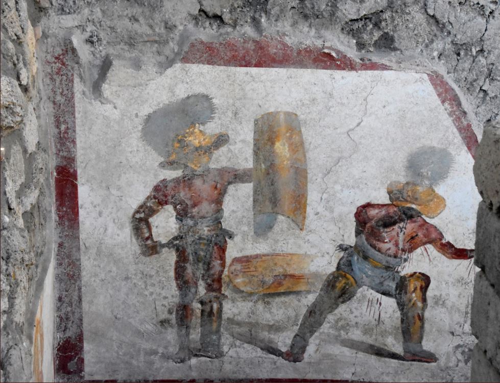 Pompei svela un altro capolavoro: l’affresco dei gladiatori